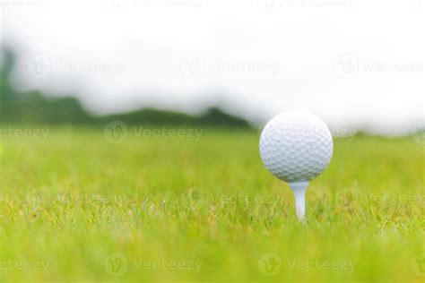 Close up of Golf ball on tee on golf course 3817444 Stock Photo at Vecteezy