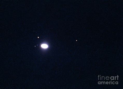 Photograph Of Saturn And Moons Through Telescope Photograph by John ...