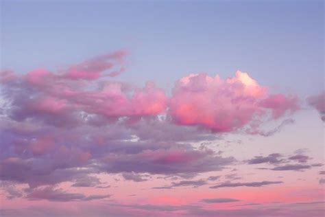 Magic pink sunset sky with clouds