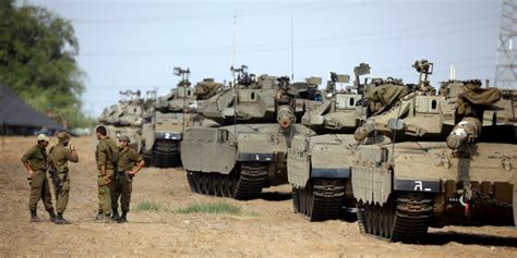 IDF Tanks Stare Down Lebanese Troops, Hezbollah Fighters in Tense ...