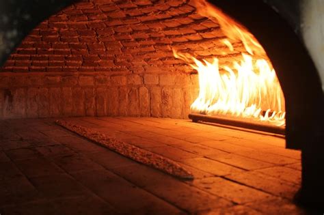 Premium Photo | In a restaurant pita or pide bread cooking in oven or stove