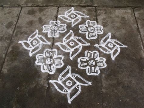 Rangoli designs/Kolam: S.No. 40 :-15-1 ner pulli kolam