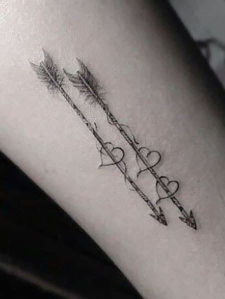 Share 79+ arrow through heart tattoo - in.cdgdbentre