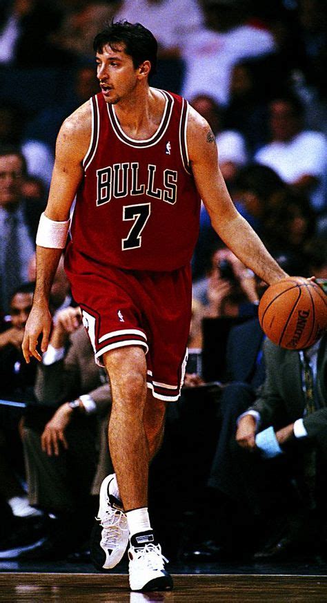 Toni Kukoc of the Chicago Bulls advances the basketball on the court ...