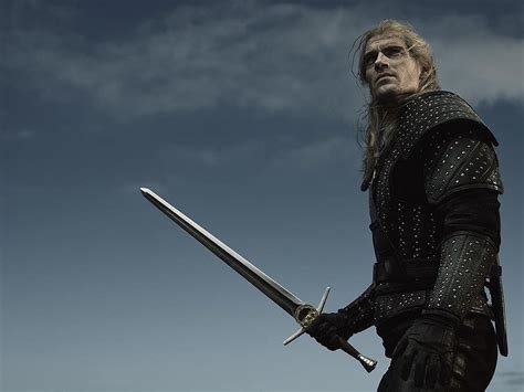 Henry Cavill Whips out His Sword as New The Witcher Photo Surfaces