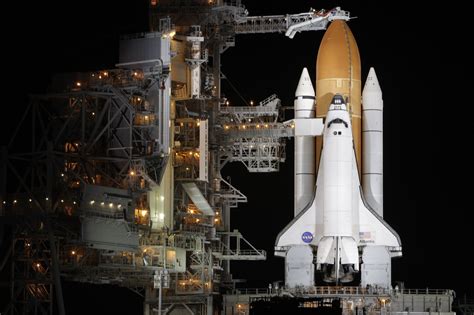 ESA - Shuttle Atlantis on launch pad by night STS-122