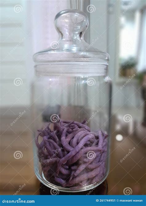 Purple snacks stock image. Image of bottle, purple, crispy - 261744951