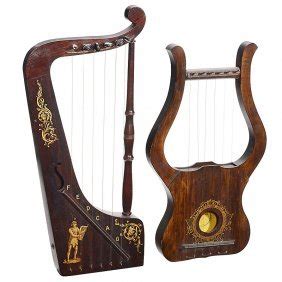 104B: 6 String Hand Held Harp Like Instrument : Lot 104B