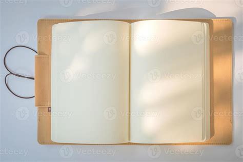 Blank Notebook on a White Paper Background 6990605 Stock Photo at Vecteezy