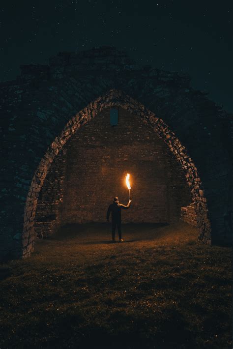 person holding torch in building interior | Fire photography, Fantasy ...