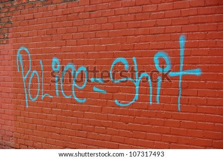 Red Brick Wall Graffiti Spray Painted Stock Photo (Edit Now) 107317493 ...