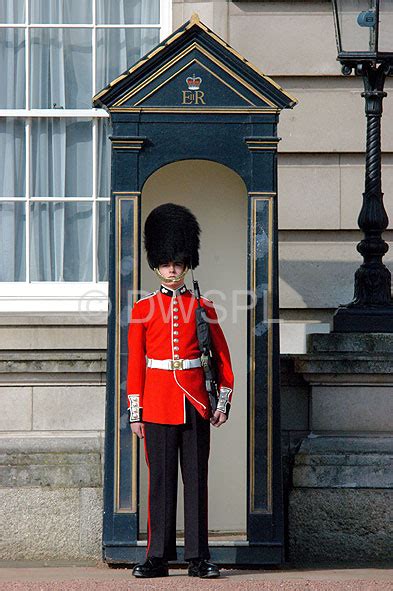 A ROYALTY FREE IMAGE OF: QUEEN'S GUARD, BUCKINGHAM PALACE, LONDON, ENGLAND