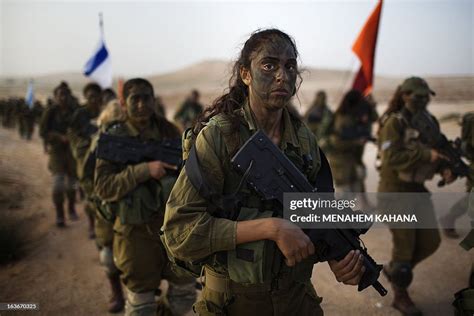 Israeli female soldiers of the 33rd Caracal Battalion take part in a ...