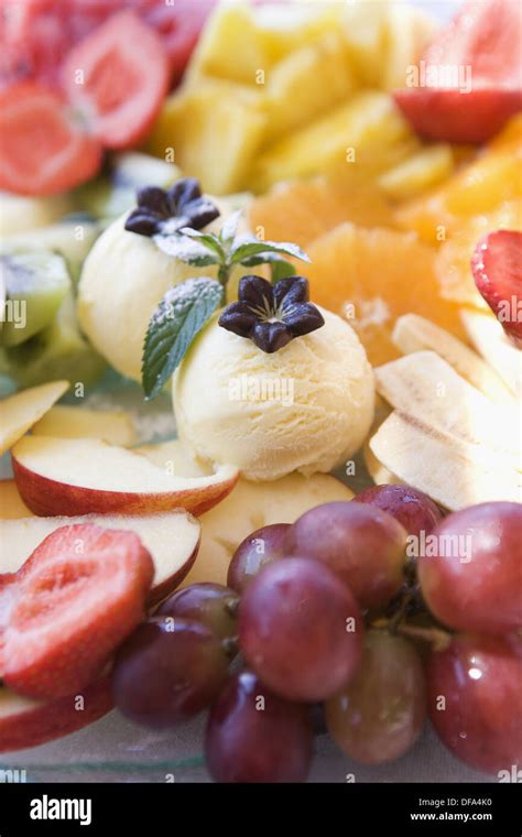 Fresh Fruit Salad with Vanilla Icecream Stock Photo - Alamy