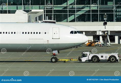 TUG Pushback Tractor With Aircraft. Royalty-Free Stock Photo ...