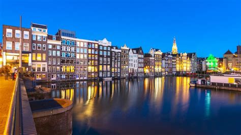 Amsterdam Architecture Along Damrak Canal at Night, Netherlands Stock ...