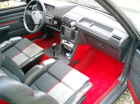 Peugeot 205 GTI 1.9l Front interior red carpet | Peugeot, Gti, Renault ...