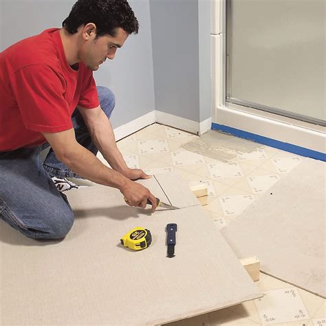 How to Lay Tile: Install a Ceramic Tile Floor In the Bathroom | Family ...