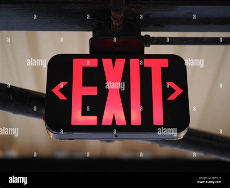 Image of a red emergency exit sign Stock Photo - Alamy