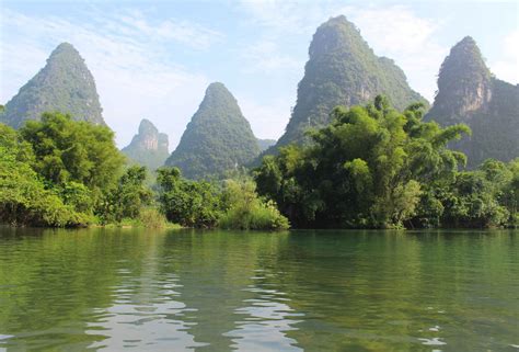 Yangshuo karst mountains: exploring it on bicycles and a bamboo raft