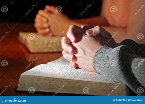 Couple Praying Bibles stock image. Image of married, female - 4732901