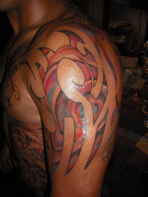 19 Unique Colorful Tribal Tattoos