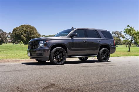 Black on Black Chevy Tahoe with Custom Projector Headlights — CARiD.com ...