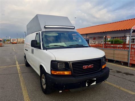 Custom built HIGH roof GMC cargo van... Why worry about buying a high ...