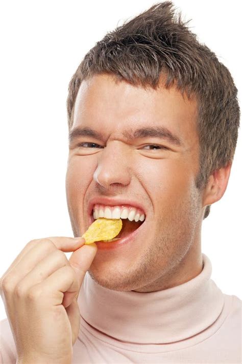 Portrait Of Young Man Eating Chips Royalty Free Stock Photography ...