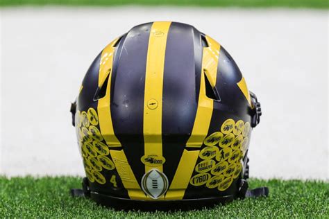 Michigan helmet stickers, explained: Why Wolverines players have decals ...