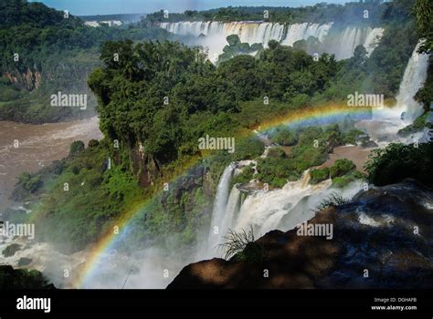 Rainbow at Iguazu Falls Stock Photo - Alamy