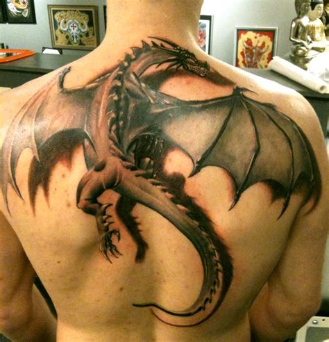 Large fantasy dragon tattoo on back - Tattooimages.biz