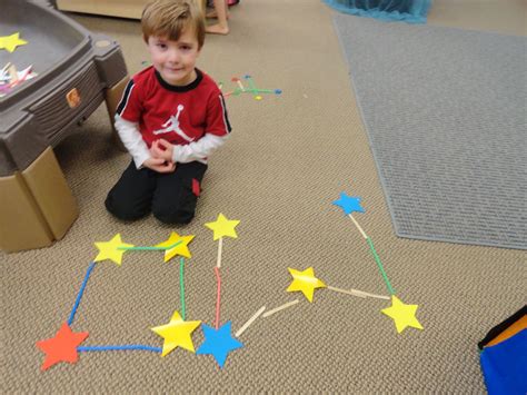 Constellation building with paper stars, craft sticks and straws Space ...