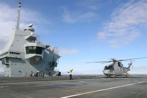 First Merlin Mk2 helicopter lands on HMS Prince of Wales aircraft carrier