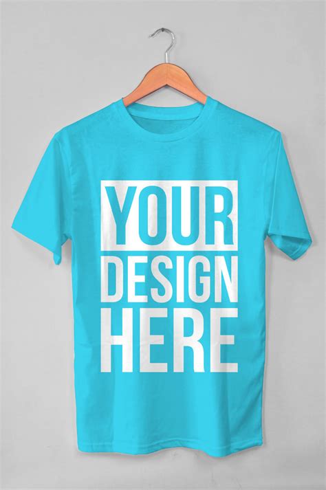 Free Hanging Blue T-Shirt Mockup - CreativeBooster