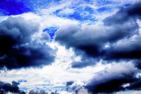 Blue Sky with Storm Clouds Photograph by Gregory Gendusa - Pixels