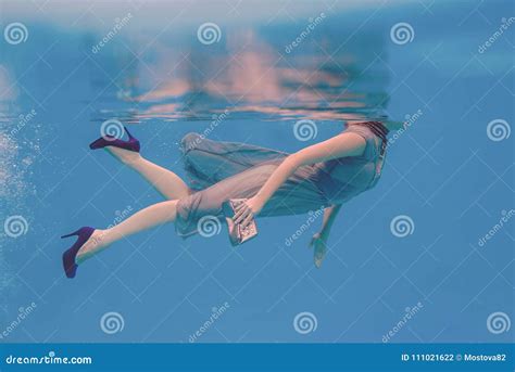 Surreal Art Portrait of Young Woman Underwater in the Swimming Pool ...