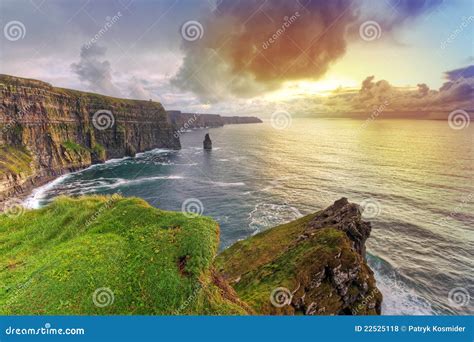 Cliffs of Moher at sunset stock photo. Image of huge - 22525118