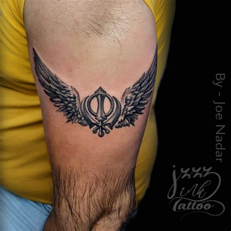 30+ Khanda Tattoo Designs that Visualize Sikh Spirituality - 100tattoos.com