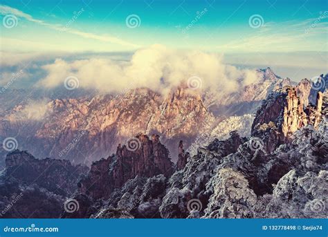 Cliffs in Huangshan National Park at Foggy Winter Evening Stock Photo ...