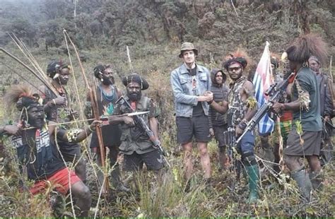 West Papua National Liberation Army with New Zealander hostage Philip ...