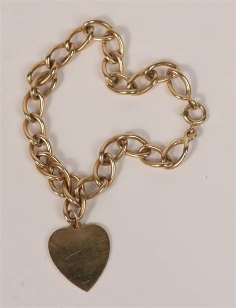 Lot Detail - 14K Gold Chain Bracelet with 14K Gold Heart Charm