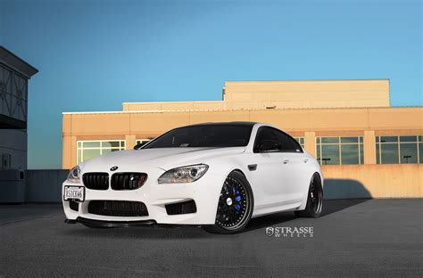 White BMW 6-Series Wearing Black Rims Featuring Blue Calipers — CARiD ...