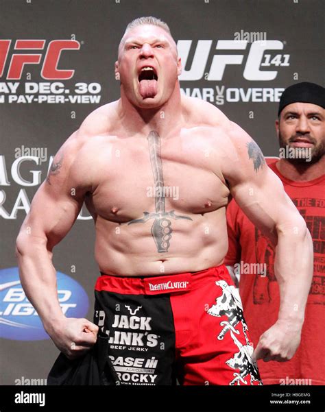 UFC fighter Brock Lesnar arrives at the weigh-ins for UFC 141 at the ...