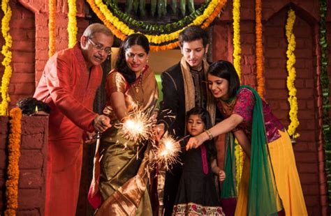 Diwali Family Stock Photos, Pictures & Royalty-Free Images - iStock