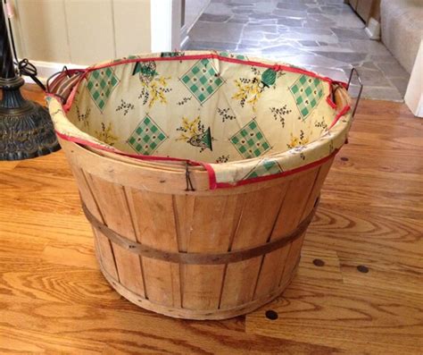 Vintage wooden laundry bushel basket with fabric liner