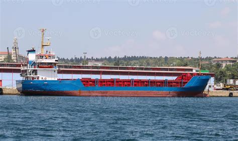 Cargo ship loading 10299028 Stock Photo at Vecteezy