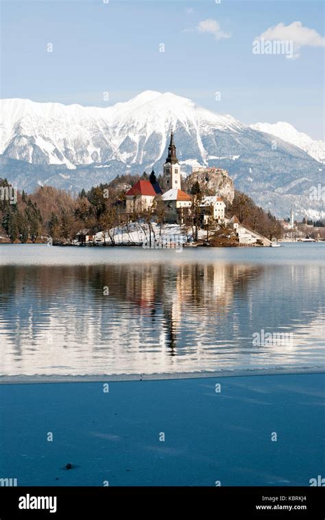 Lake Bled with castle behind in winter, Bled, Slovenia Stock Photo - Alamy