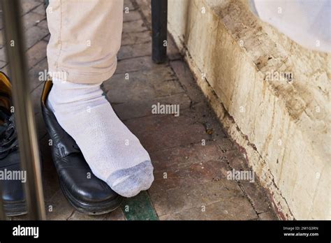 black shoes and white socks in a comfortable situation Stock Photo - Alamy