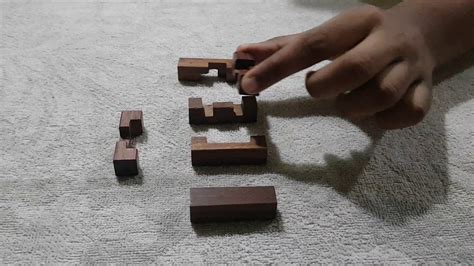 How to solve a wooden puzzle cross - YouTube